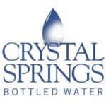 A blue and white logo of crystal springs bottled water.